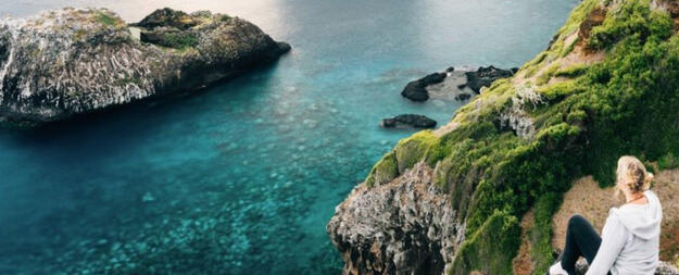 woman on cliffs norfolk island