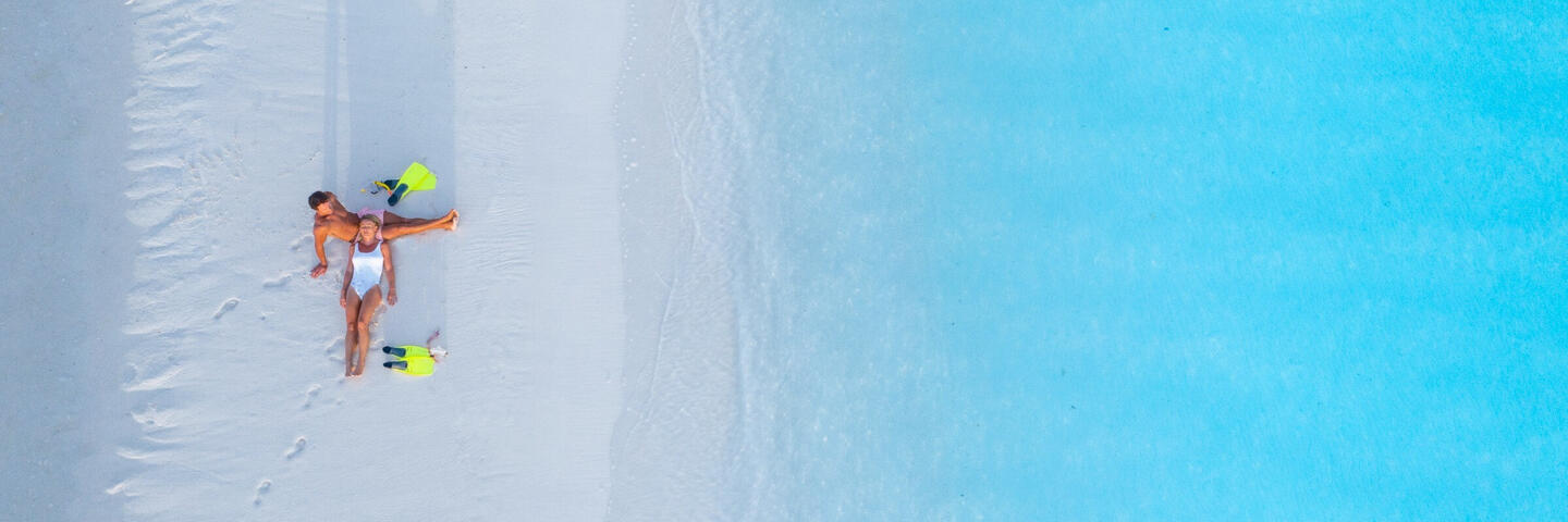 couple at one foot island aitutaki