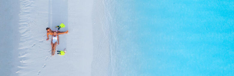 couple at one foot island aitutaki