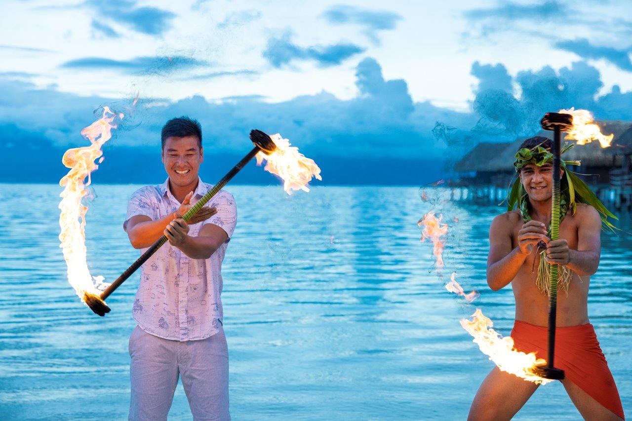 twirling fire sticks in Tahiti