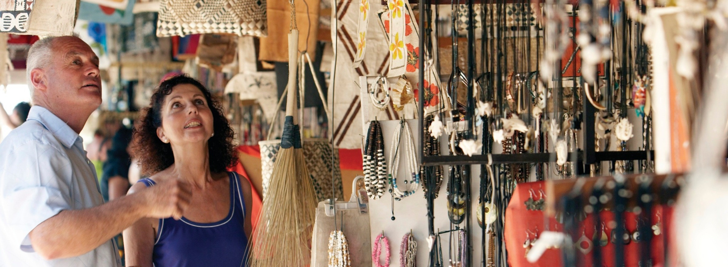 Man and woman shopping for local souvenirs in Fiji