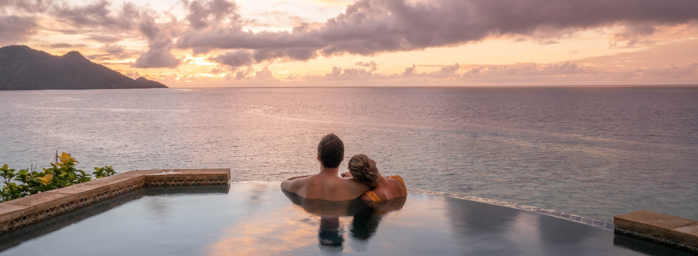 couple in pool at Royal Davui