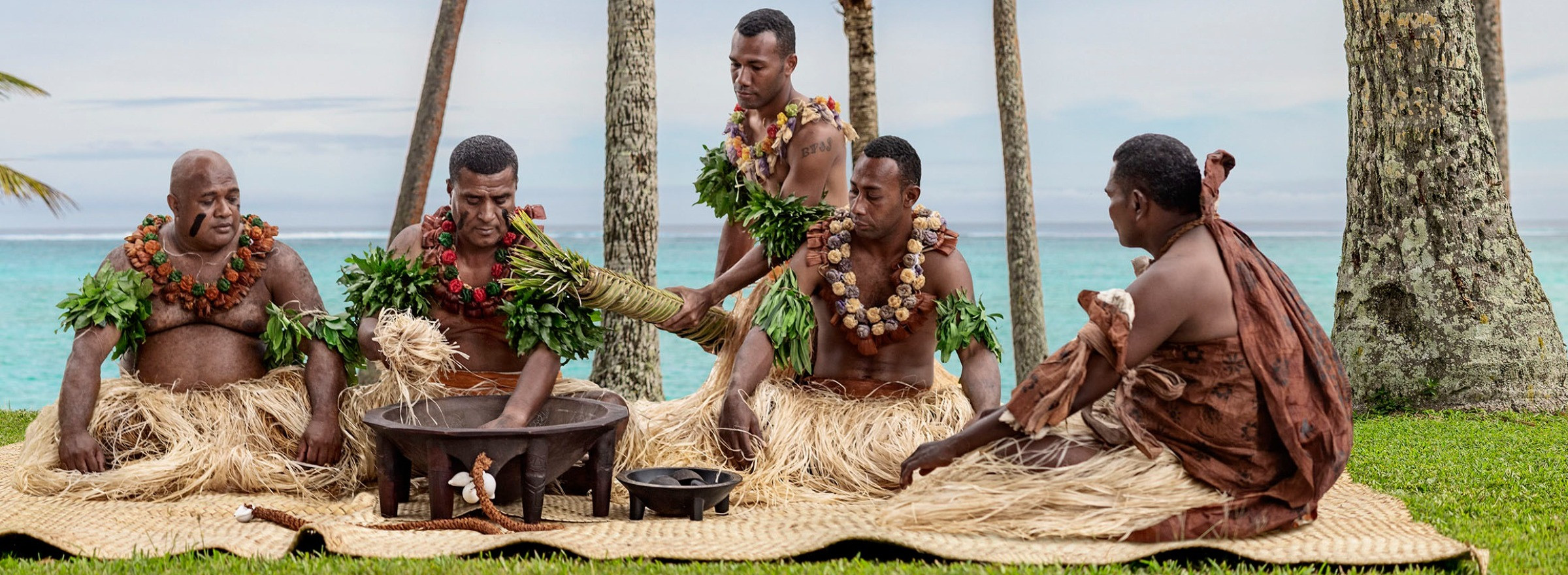 Group of Fijians celebrating a ceremony with Kava