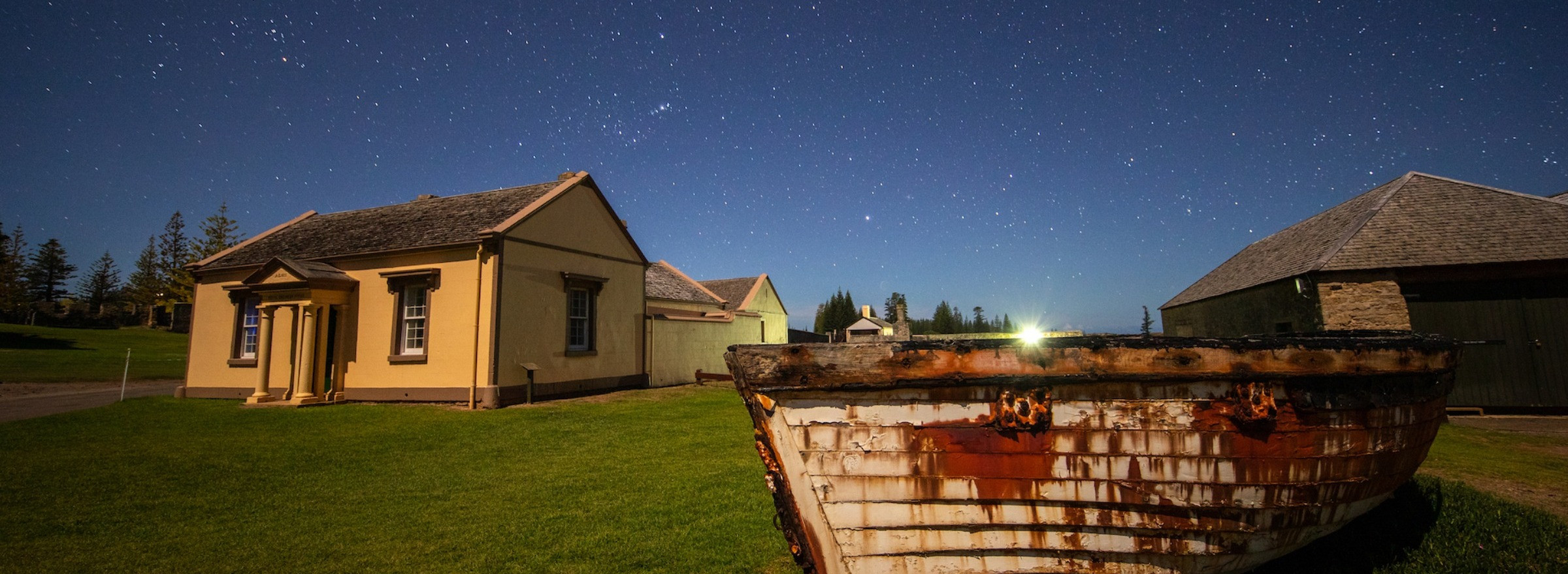 Boat under a starry night sky in the Kingston region on Norfolk Island