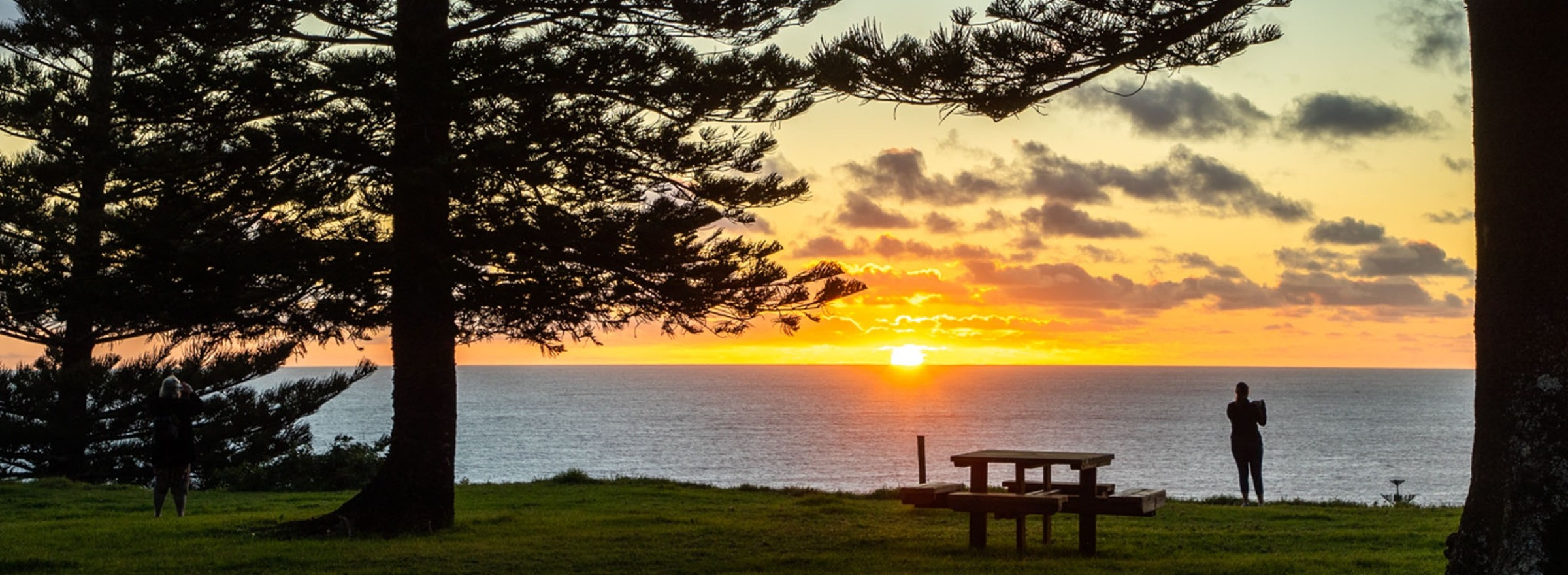 image of woman at sunset Norfolk Island