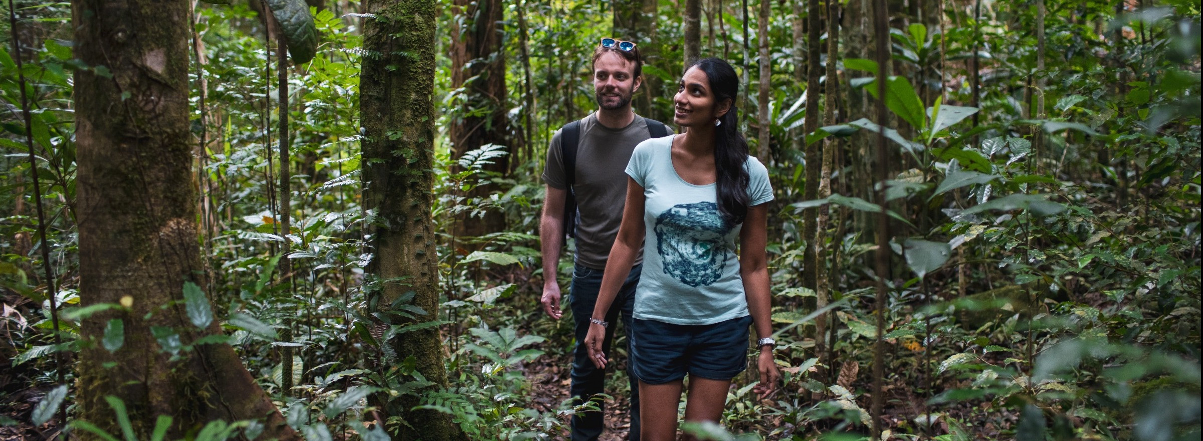 couple walking in Rainforest
