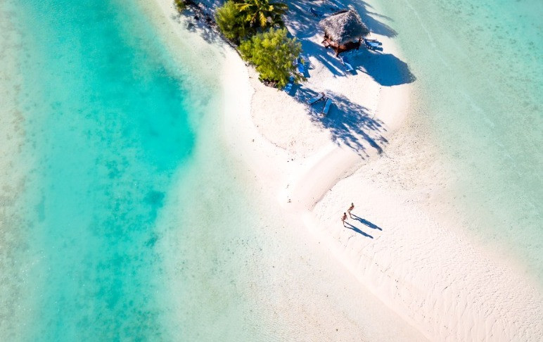 Aitutaki Lagoon Remote Couple walking on beach (Kuriri Point) - Cook Islands - Aitutaki Lagoon