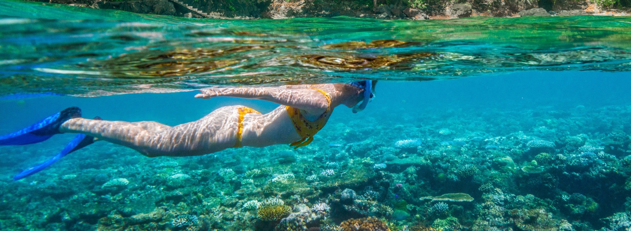 woman snorkeling Royal Davui Fiji
